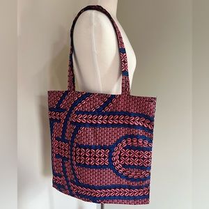 Colorful pink and blue cowrie shell print tote West African wax fabric shopping